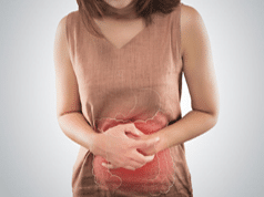 lady-holding-her-stomach-with-possible-ibs-digestive-enzymes-may-help-with-ibs